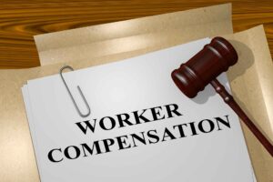 Workers' Compensation File and Gavel for Workers' Comp Commissioner