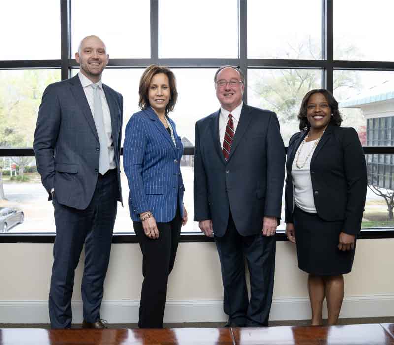 group photo of attorneys at Mickle and Bass Law Firm