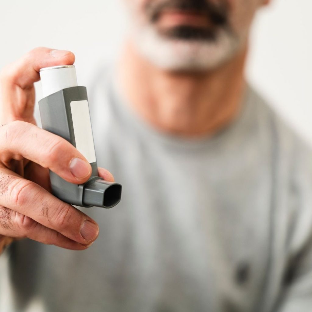 man with inhaler
